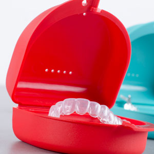 custom whitening tray in red case