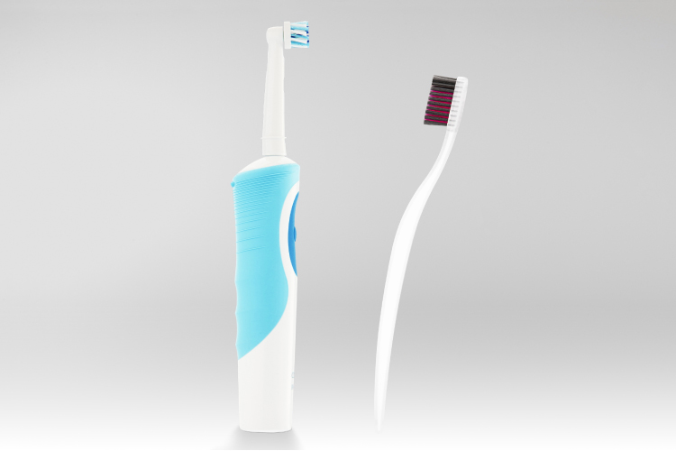 electric and traditional toothbrushes face off